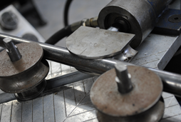 Stainless steel hydraulic tubing is bent to specifications for commercial and industrial use.