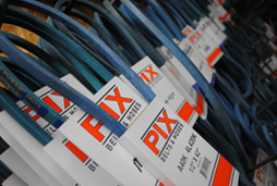 Sirco Industrial variety of belts and hoses on display.