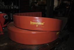 Lay flat industrial hose shown at Sirco Industrial Supply’s warehouse in Erie, PA.